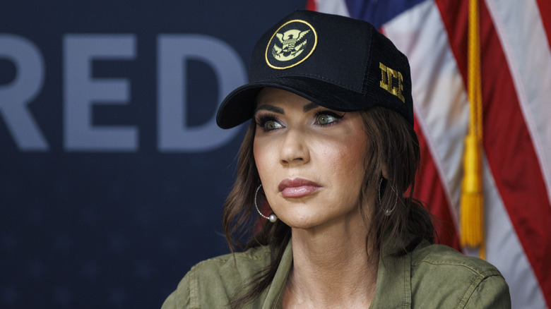 Kristi Noem wearing a baseball cap