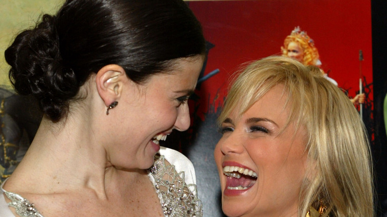 Kristin Chenoweth and Idina Menzel grinning