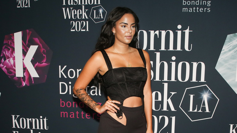 Kyra Green posing at event 