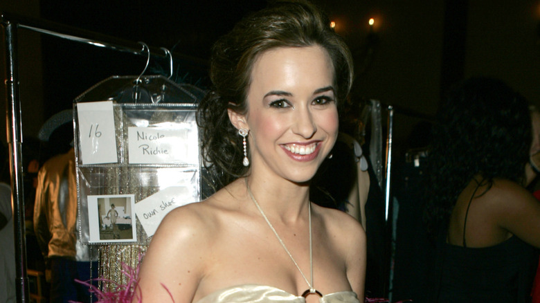 Lacey Chabert smiling at an event