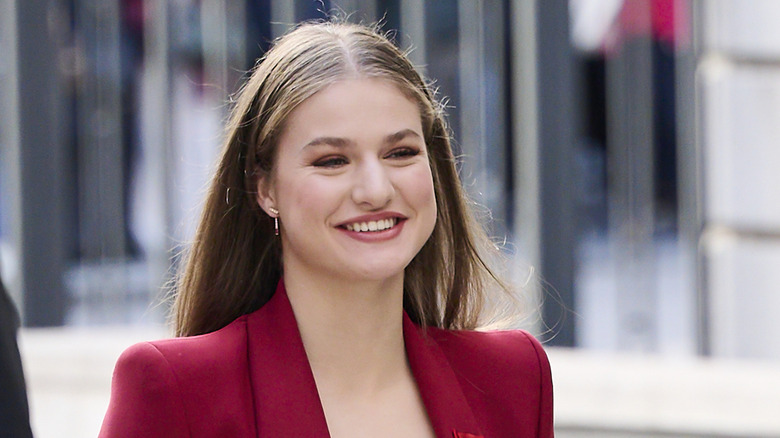 Princess Leonor smiling in a red blazer