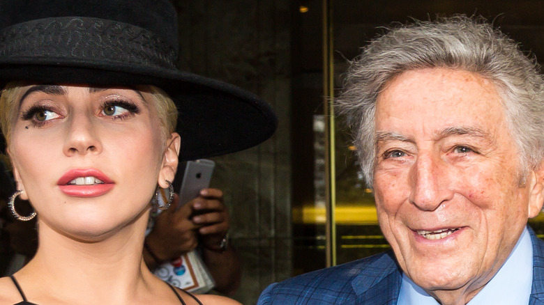 Lady Gaga and Tony Bennett posing for cameras