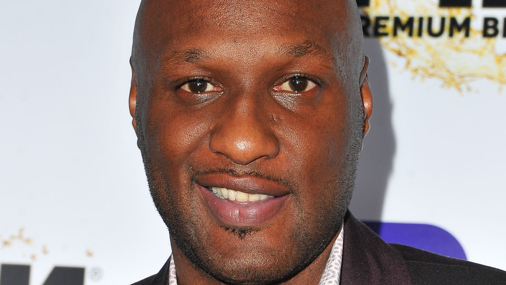 Lamar Odom smiling with scruff