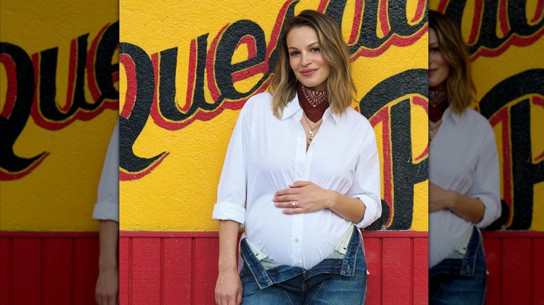Pregnant Kayla Wallace showing off her baby bump
