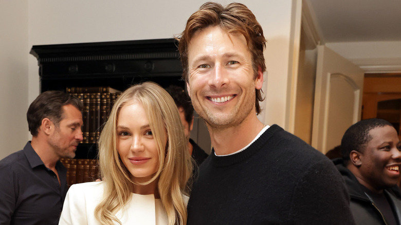 Michelle Randolph and Glen Powell at F1 event