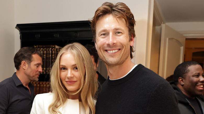 Michelle Randolph and Glen Powell together at an event for teh movie F1.
