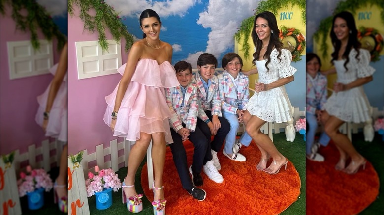 Erin Elmore smiling with sister Ashley Elmore and family