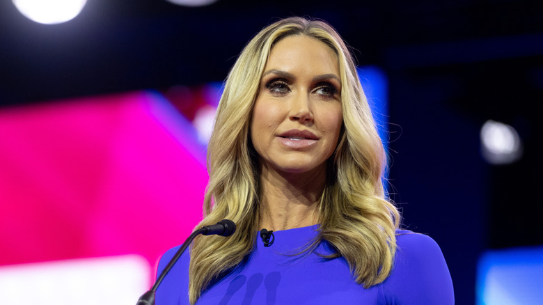 Lara Trump speaking onstage in a blue outfit