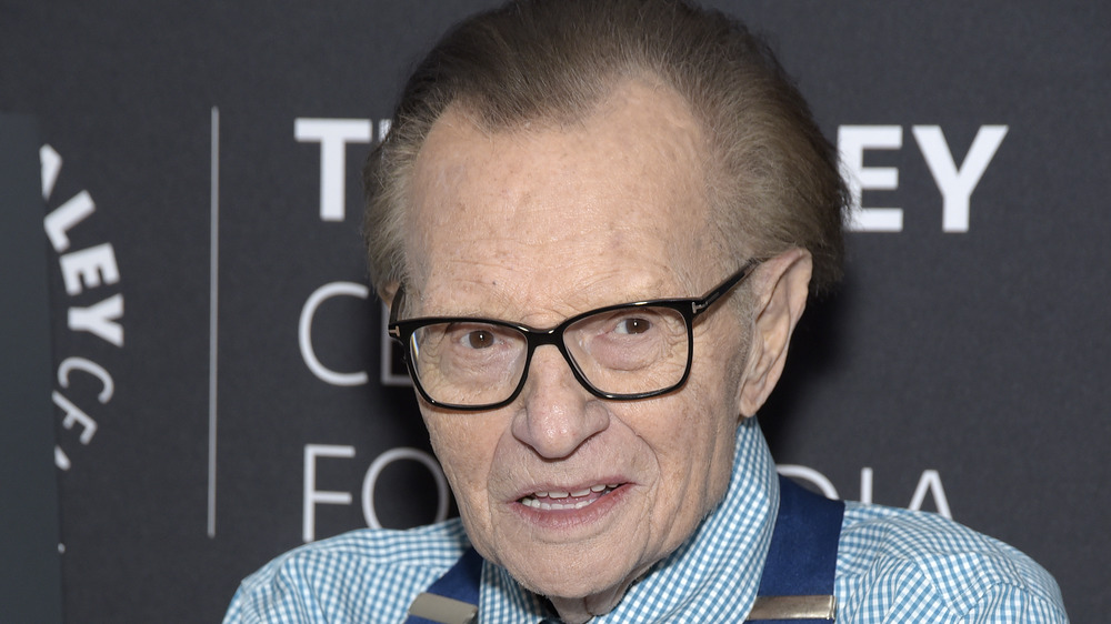 Larry King wears glasses