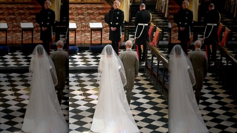 King Charles III walking Meghan Markle down aisle