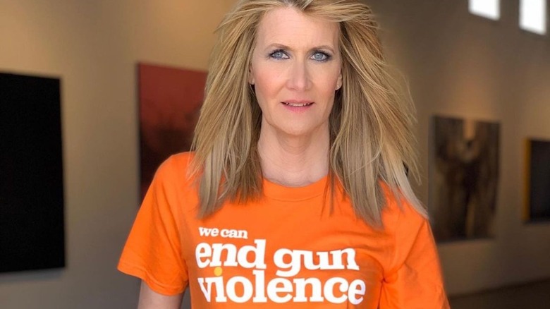 Laura Dern wearing orange t-shirt