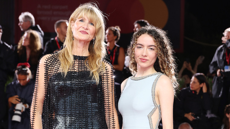 Laura Dern and Jaya Harper posing in front of a crowd.