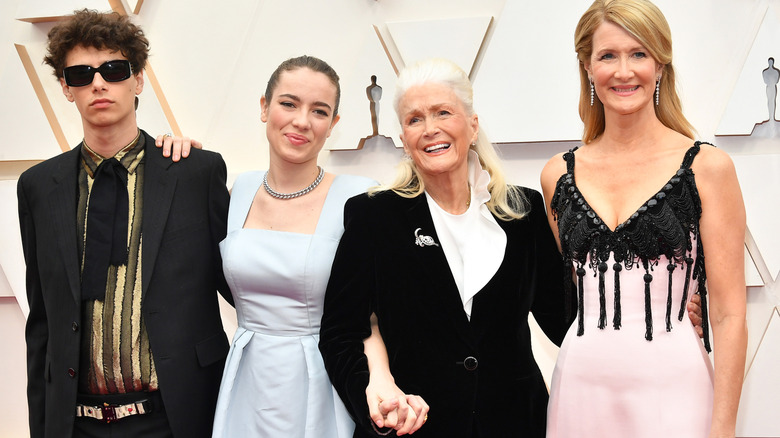 Ellery Harper, Jaya Harper, Diane Ladd, and Laura Dern posing at the Oscars.