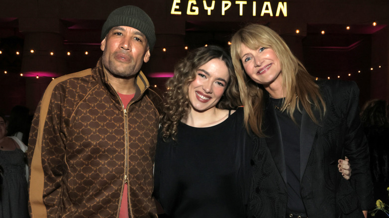 Ben Harper, Jaya Harper, and Laura Dern smiling together.