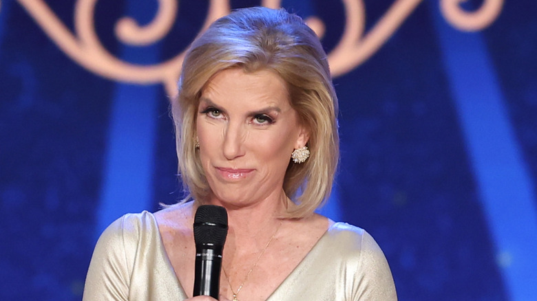 Laura Ingraham presenting at an awards show.