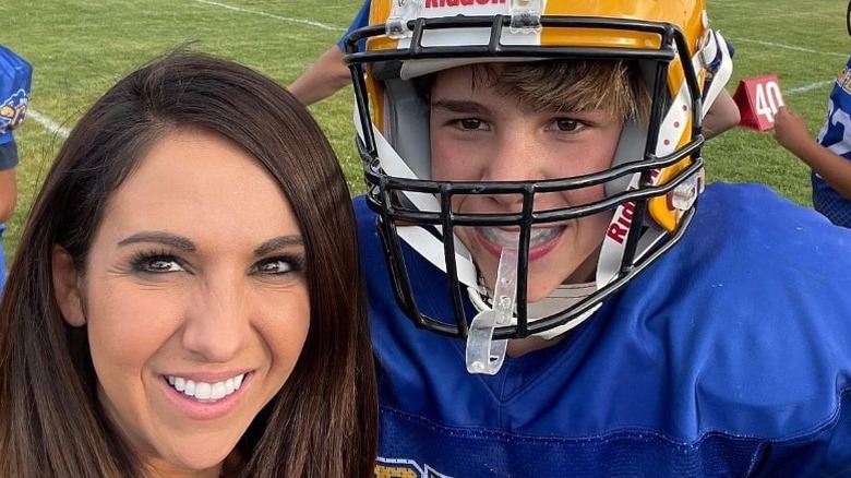 Lauren Boebert poses with her son at a football game (2022)