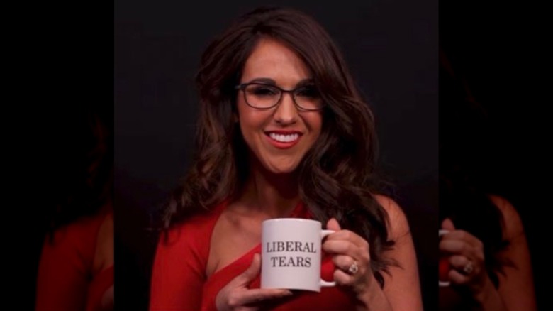 Lauren Boebert posing with a mug
