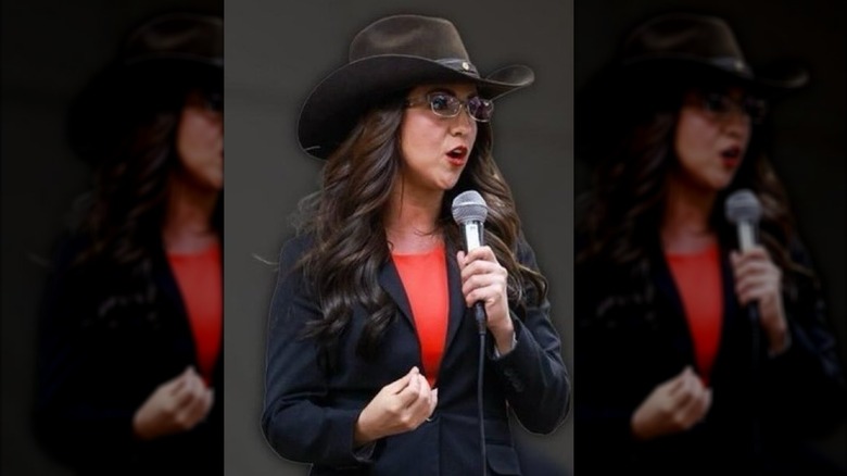 Lauren Boebert talking into a microphone