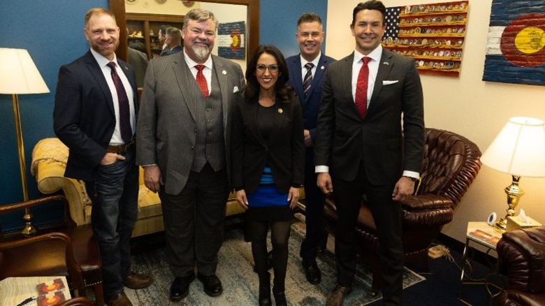 Lauren Boebert surrounded by several men in her Colorado office (2025)