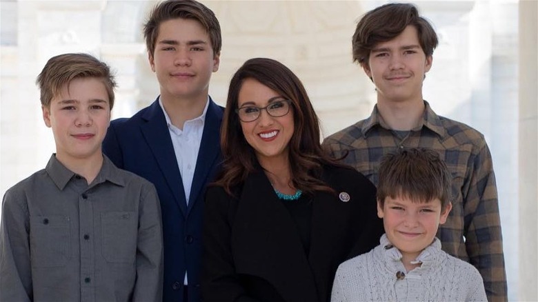 Lauren Boebert smiles with her four sons