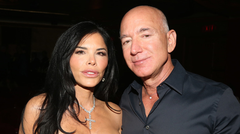 Lauren Sanchez and Jeff Bezos wearing matching-colored outfits while at the premiere of 'Sunset Blvd.'