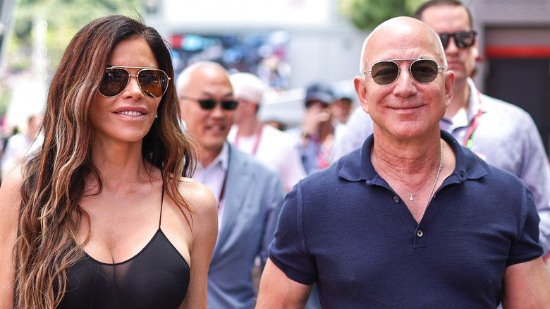 Lauren Sanchez and Jeff Bezos holding hands