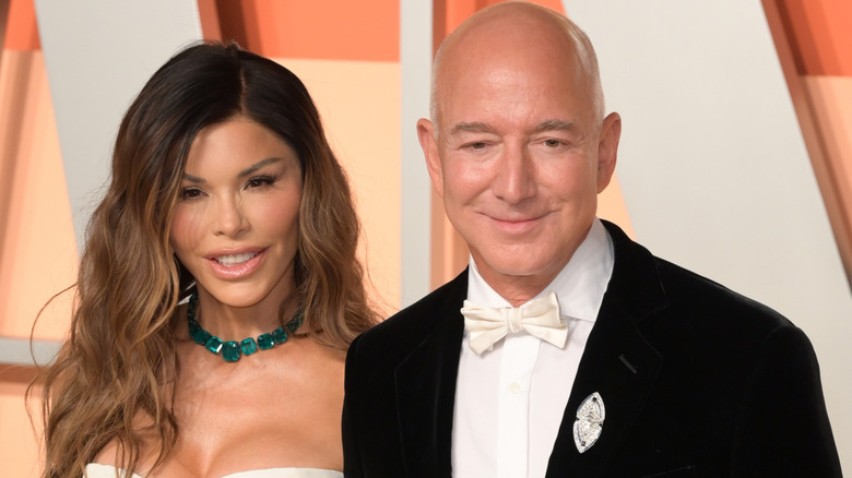 Lauren Sánchez and Jeff Bezos looking downward