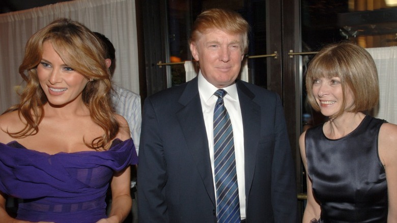 Melania Trump, Donald Trump, and Anna Wintour smiling