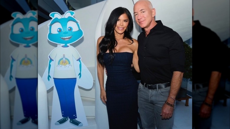 Jeff Bezos and Lauren Sánchez pose side-by-side in a photo Bezos posted to Instagram in December 2024.