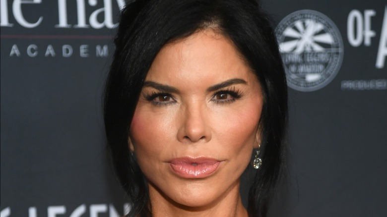 Close up of Lauren Sánchez pouting with very puffy lips