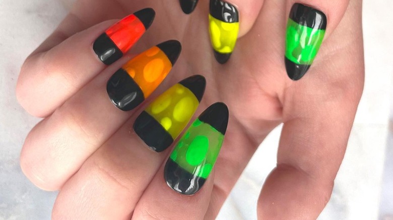 Close up on a row of lava lamp nails 