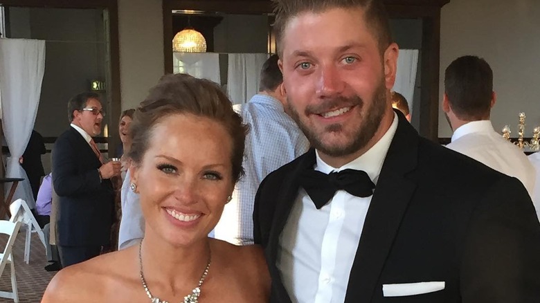 Steve and Mina Hawk smiling on their wedding day