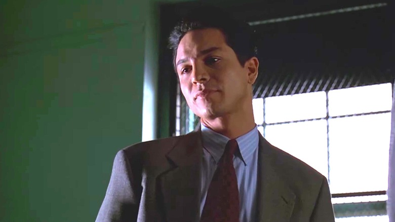 Benjamin Bratt as Rey Curtis on "Law & Order" in front of a window