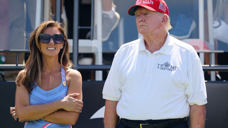 Donald Trump and Alina Habba looking uncomfortable