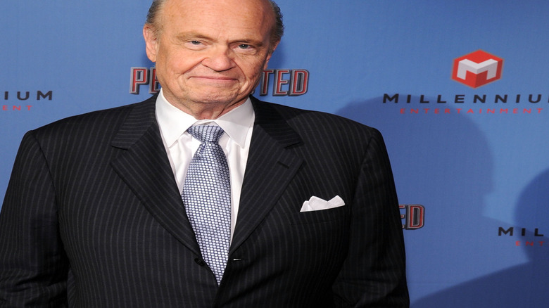Fred Thompson wearing a striped suit