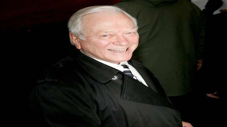 George Grizzard grinning at the camera