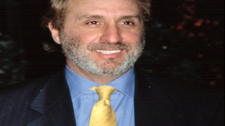 Ron Silver looking into the distance