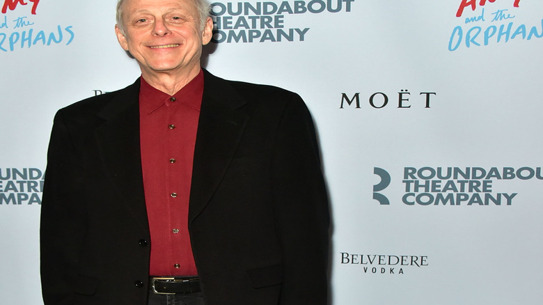 Mark Blum smiling at event