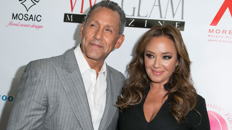 Angelo Pagan and Leah Remini posing