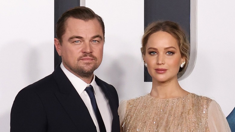 Leonardo DiCaprio and Jennifer Lawrence attend the premiere of 
