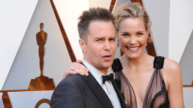 Leslie Bibb in black sheer gown and Sam Rockwell in a tux at teh Academy Awards