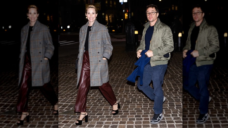Leslie Bibb in maroon leather pants and plaid coat and Sam Rockwell in gray jacket and glasses