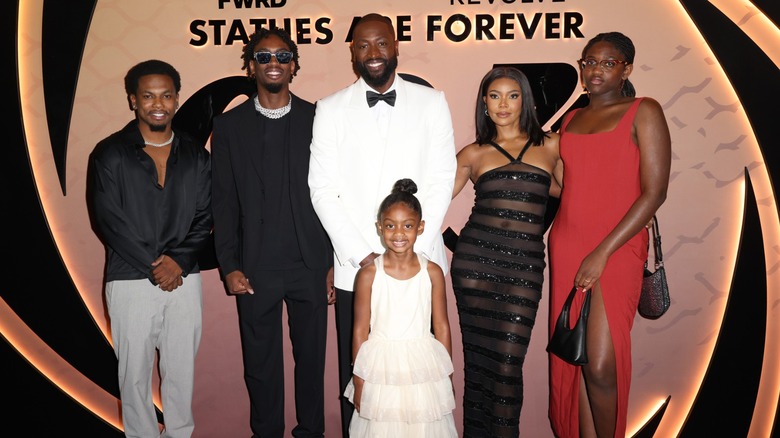 Dwyane Wade, Gabrielle Union, and kids pose together on red carpet