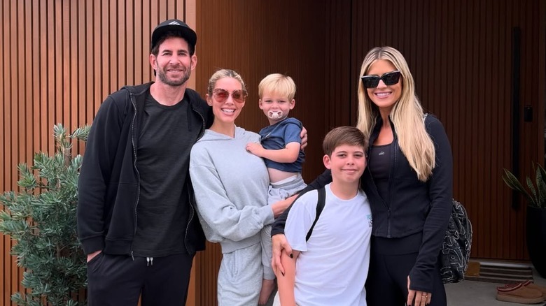 Tarek El Moussa, Heather Rae El Moussa, Christina Haack, and some of their kids smile together