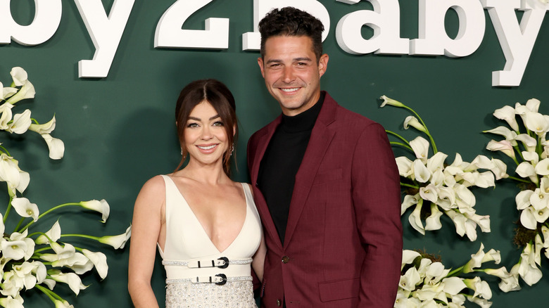 Sarah Hyland and Wells Adams smile together