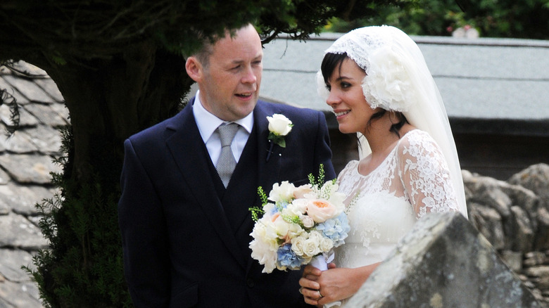 Smiling Lily Allen and Sam Cooper at their wedding in 2011