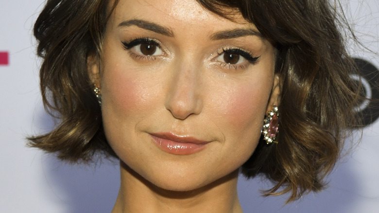 Milana Vayntrub with slight smile