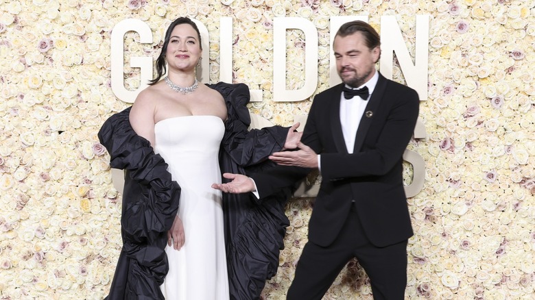 Leonardo DiCaprio with Lily Gladstone