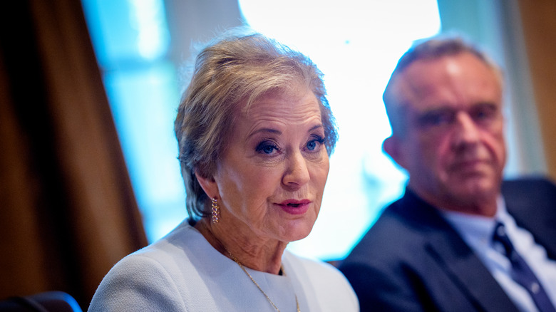 Linda McMahon photographed next to RFK Jr. during a Cabinet meeting