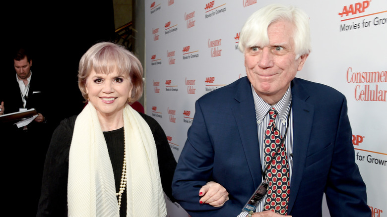 Linda Ronstadt and John Boylan arm in arm at an event in 2020.